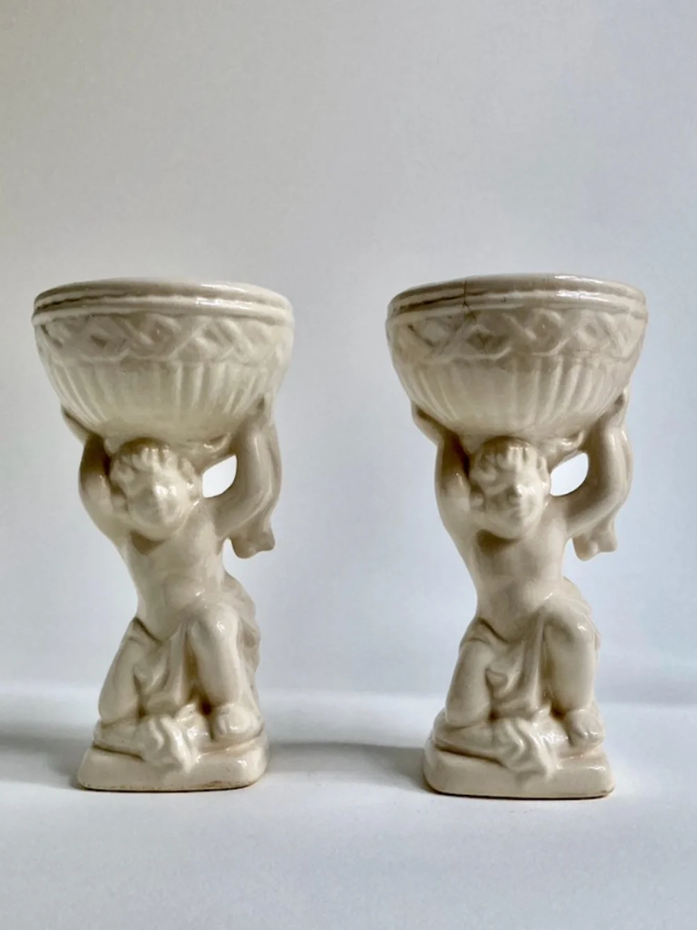 Vintage Rococo Pair of Cream Ceramic Cherub Urns